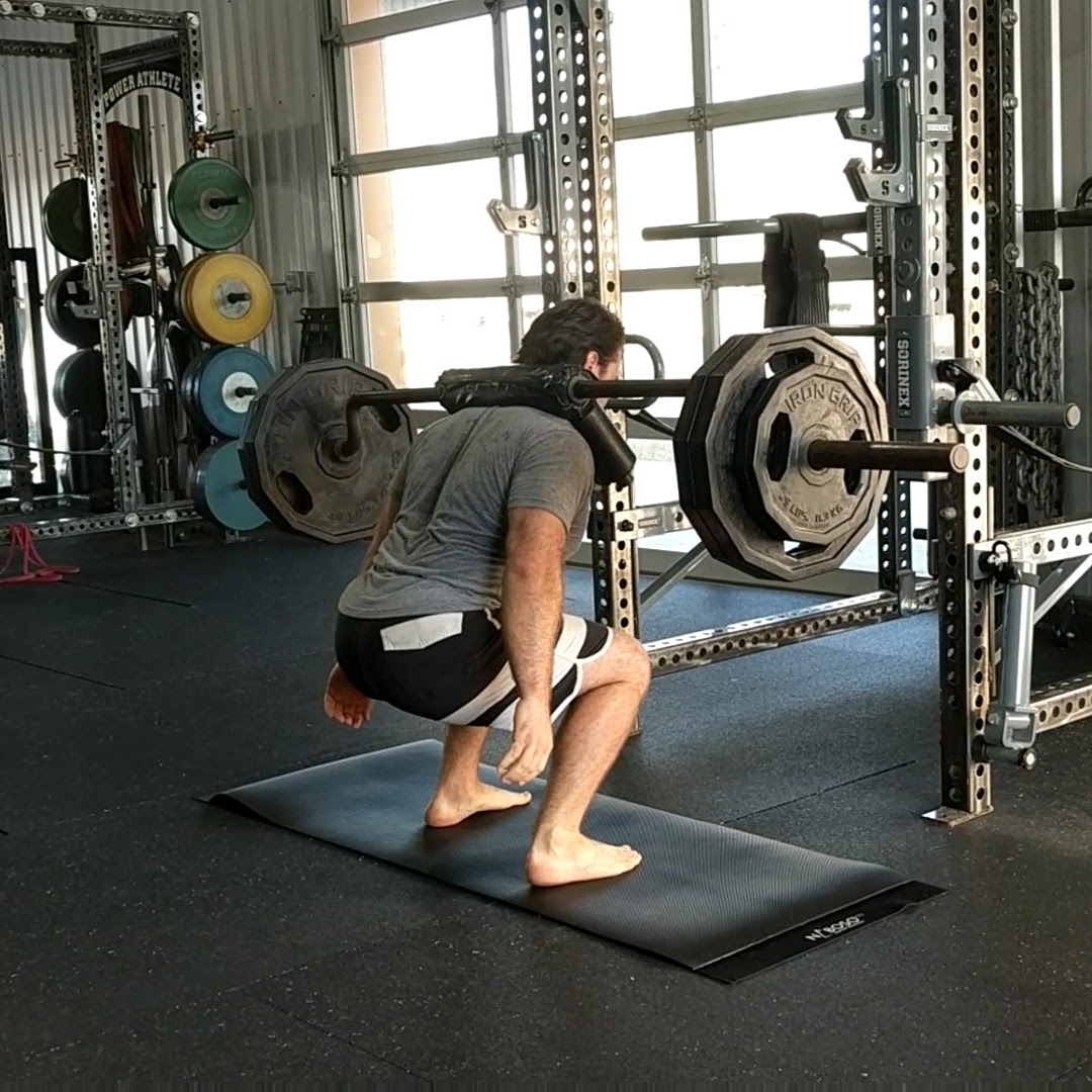 Power Athlete Squat With A Staggered Stance Power Athlete